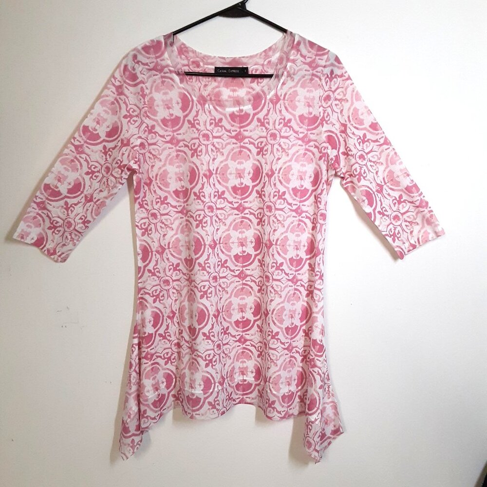 The 90's Casual Express Tunic Blouse in size SMALL features an asymmetrical hem,